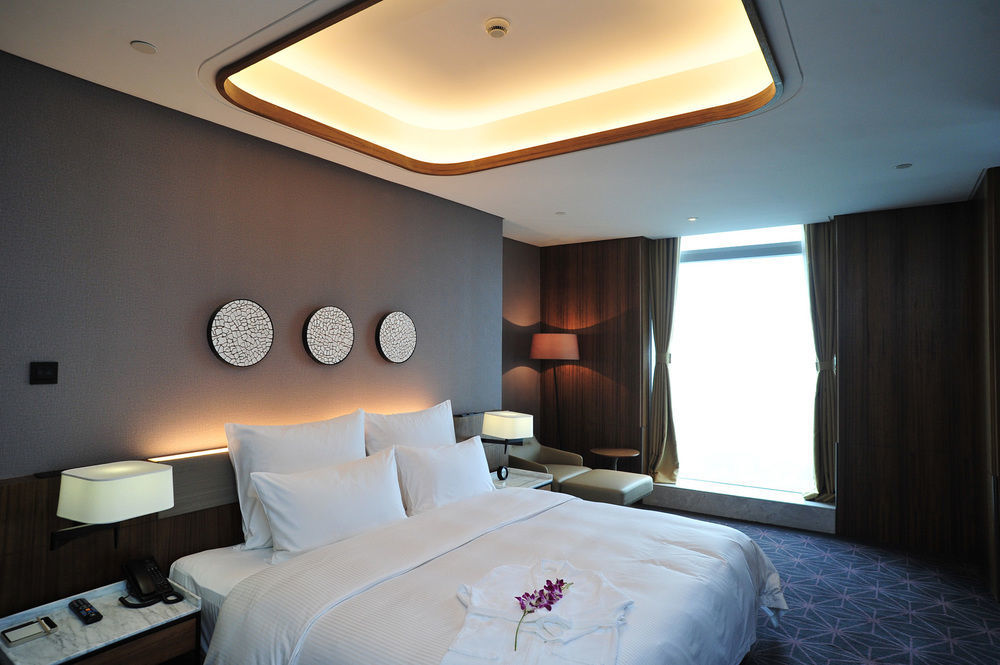 Chongqing The Lotus Hotel Экстерьер фото
